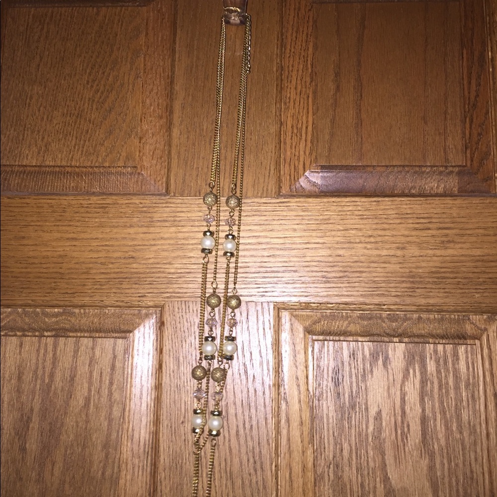 Gold, and faux pearl layered necklace.